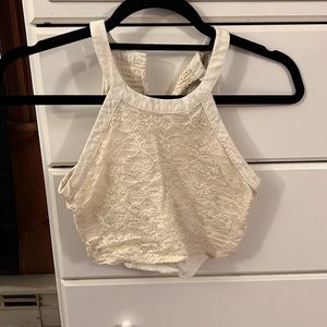 cream halter crop top with buttons in the back